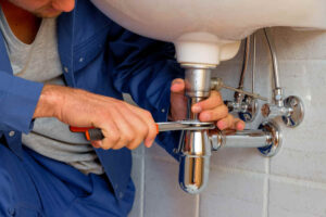 plumber fixing shower leaks